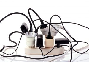 An overloaded extension cords with multiple devices plugged in is a winter electrical hazard