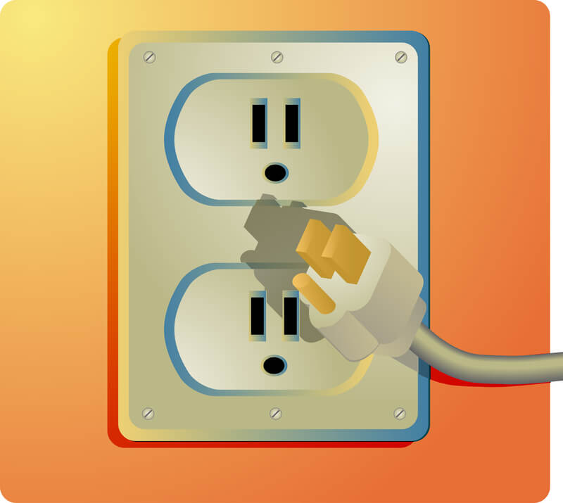 a plug looms near an outlet